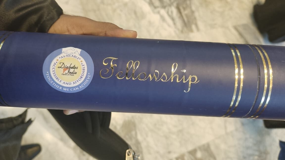 Receiving Fellowship Diploma — Diabetes India 2025
